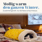 Symbolbild: Mollig warm den ganzen Winter. Zusammengerollt, nur die Nase schaut heraus.